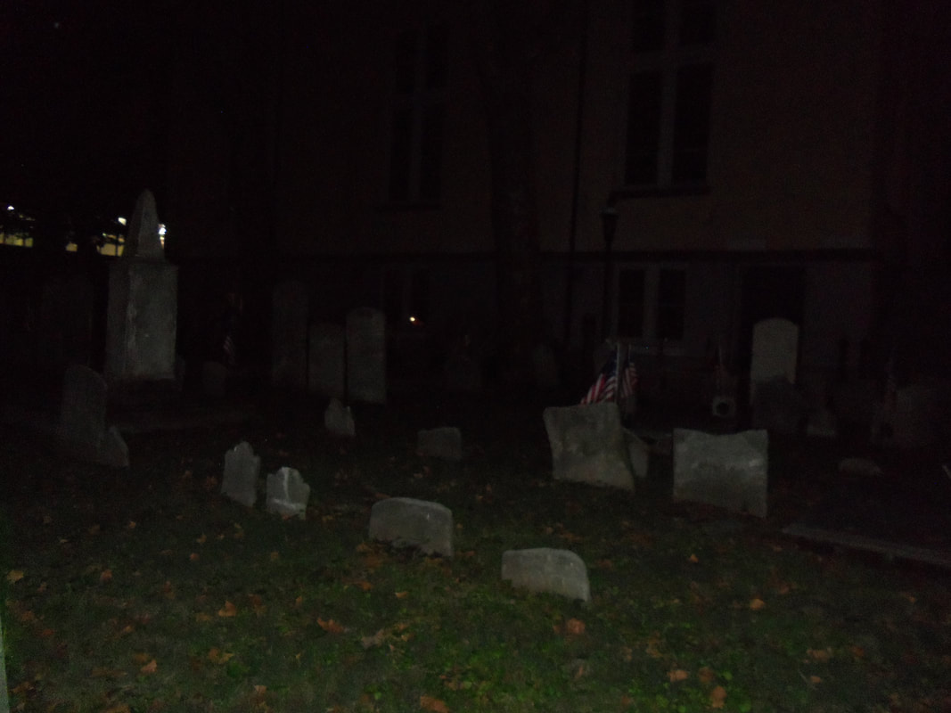 Glowing orb in the graveyard