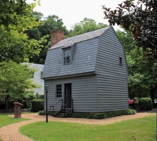 small wooden two-story shack