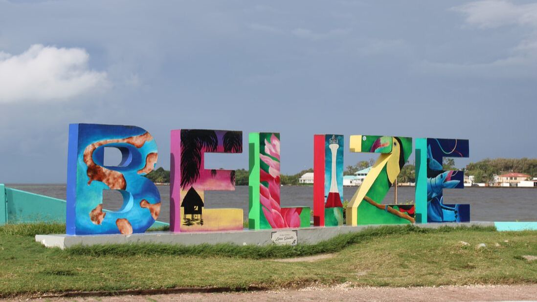 brightly colored tourism sign