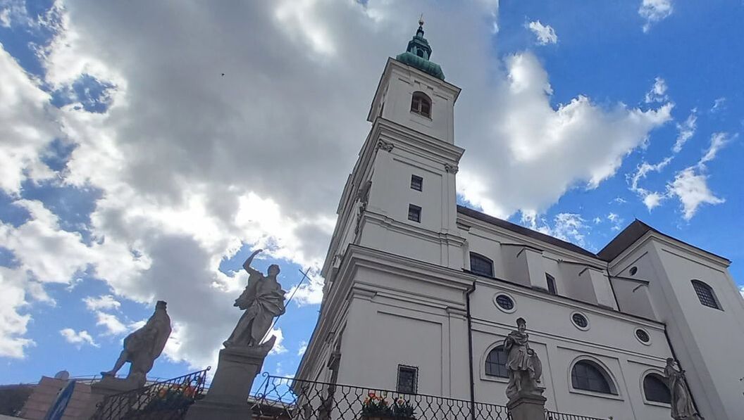 church exterior complete with statues