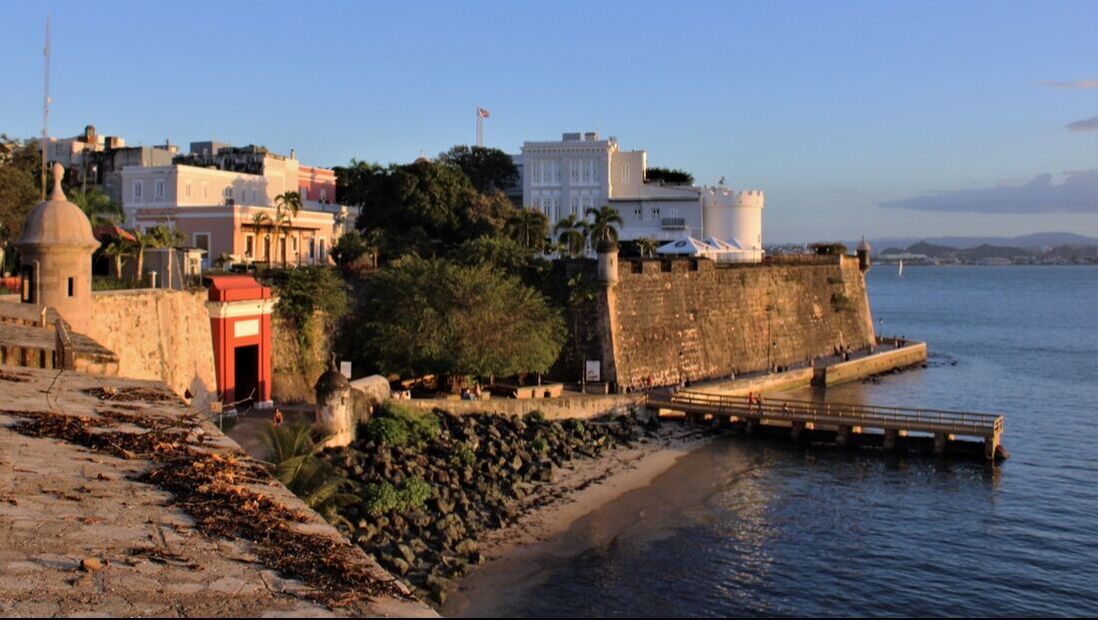 Walled fortress at sundown