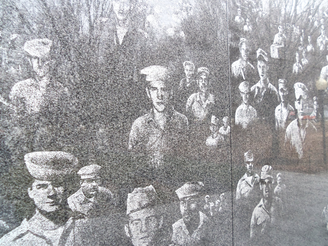 Engraved images at the war memorial