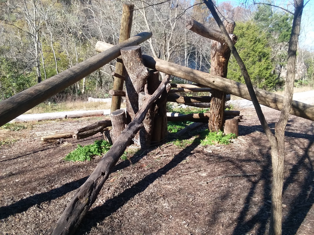 Jungle gym made of logs