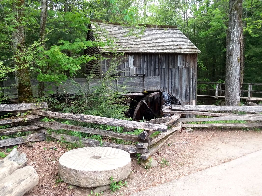 a grist mill with grind stone