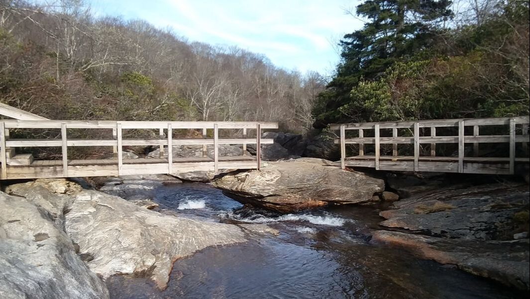 wooden bridge across the creek